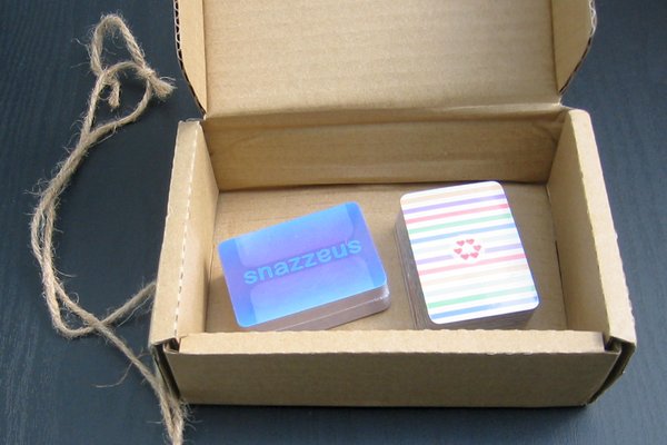 The card decks in the opened box
